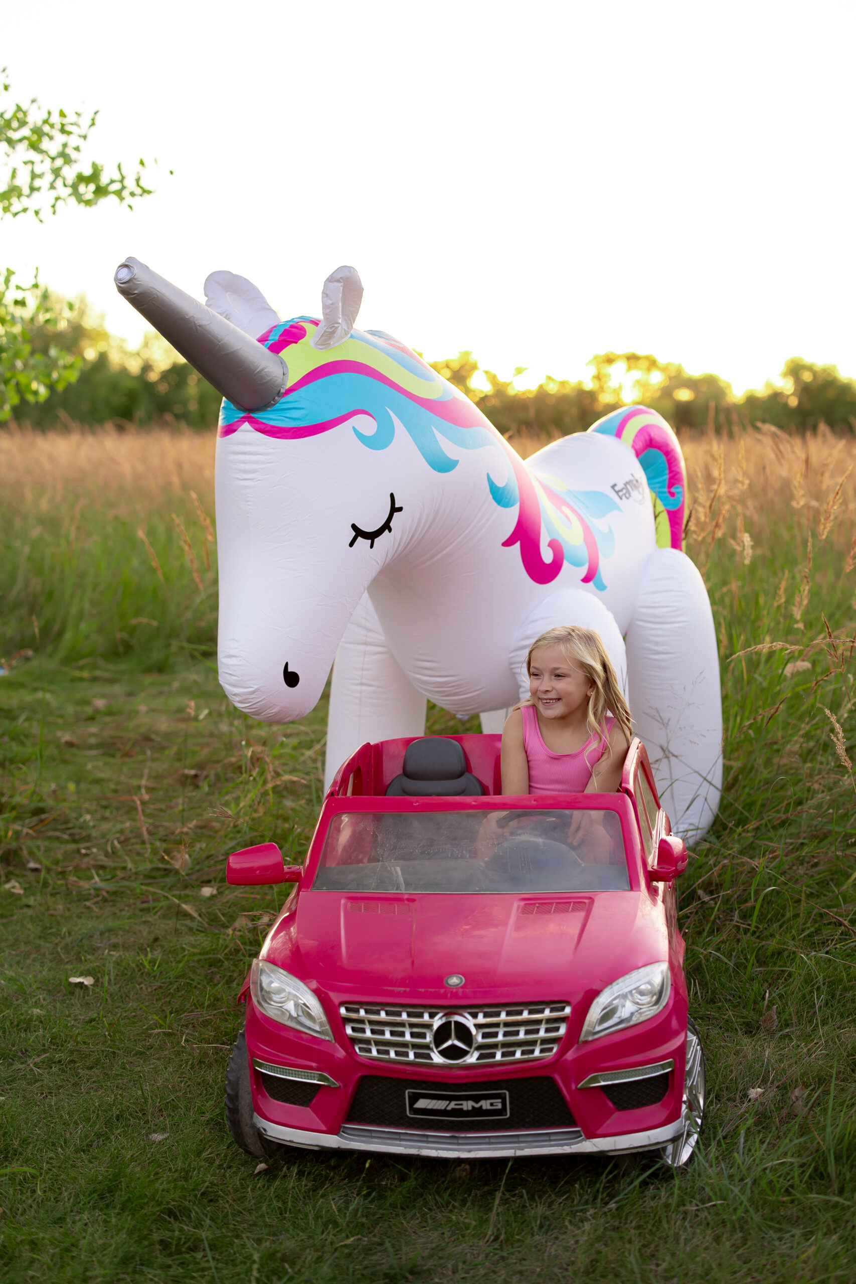 Bella in pink car with Fancy for Familyfest