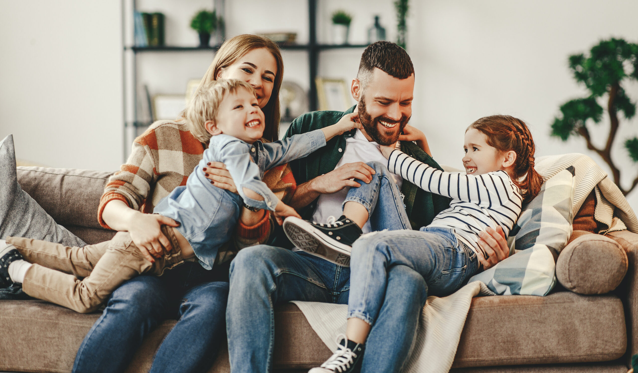 Happy Family on the Couch. Summer is coming, fun.