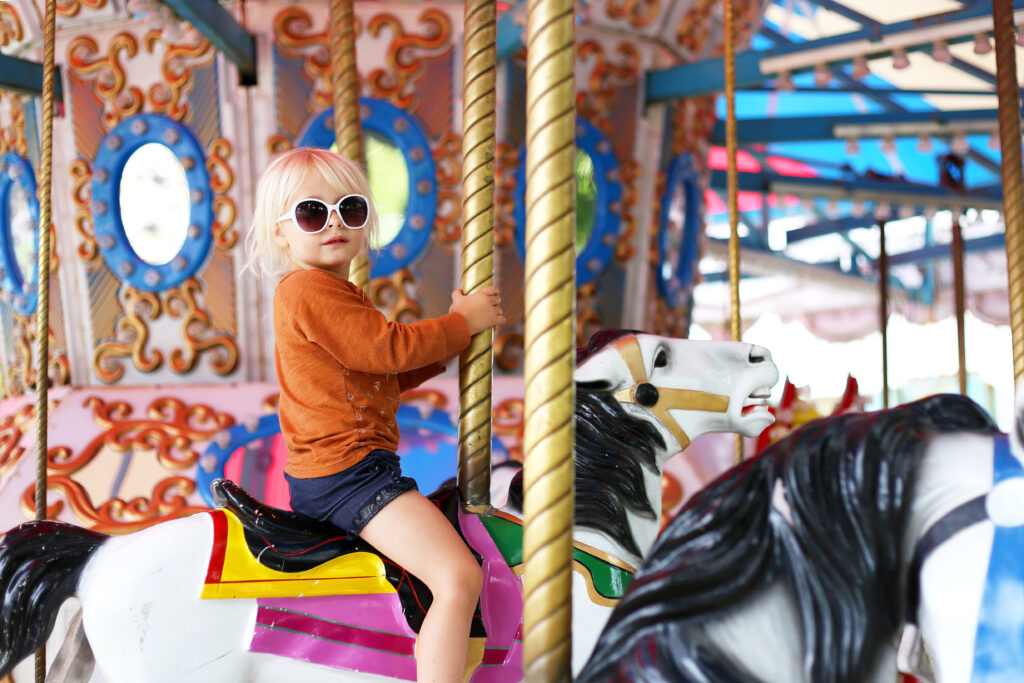 Girl on a Fair Ride for summer fun