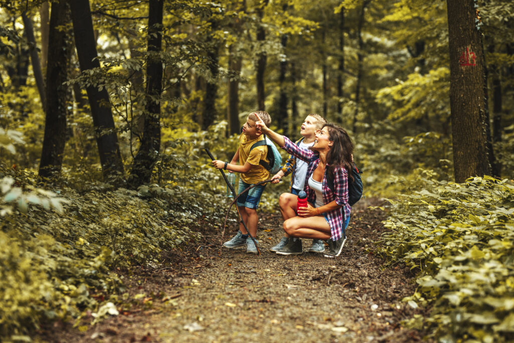 mom and kids on a nature walk