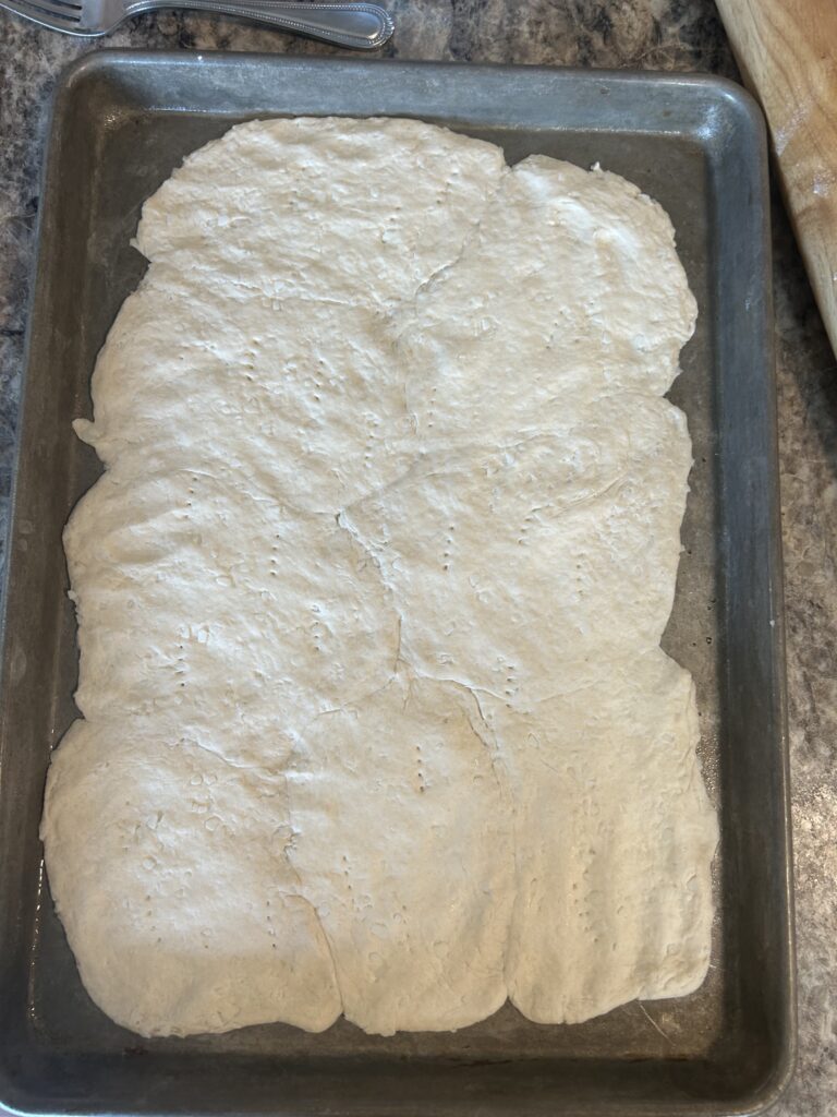 Breakfast pizza biscuit dough