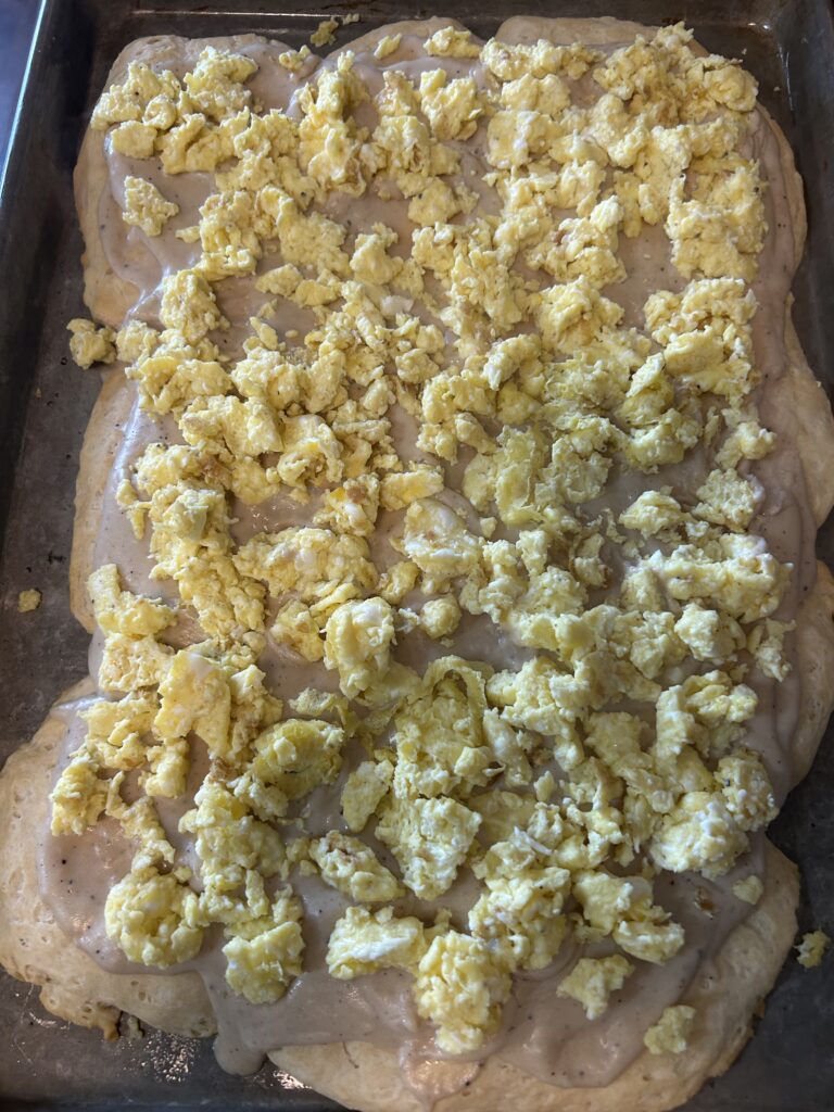 Breakfast Pizza with Gravy and Eggs