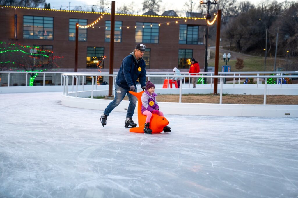 Jacobson Plaza Kid and parent skating
