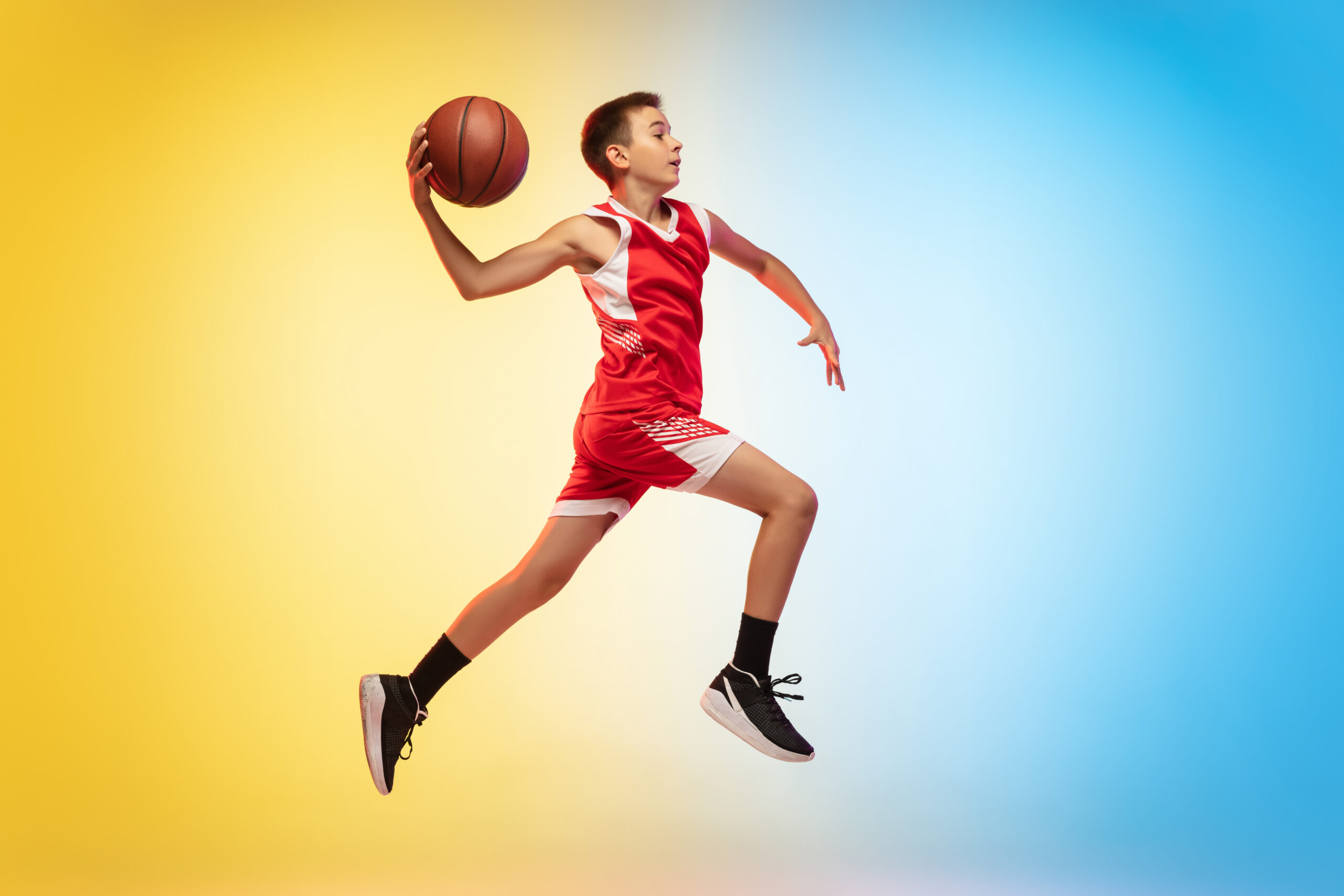 Youth Boy Playing Basketball