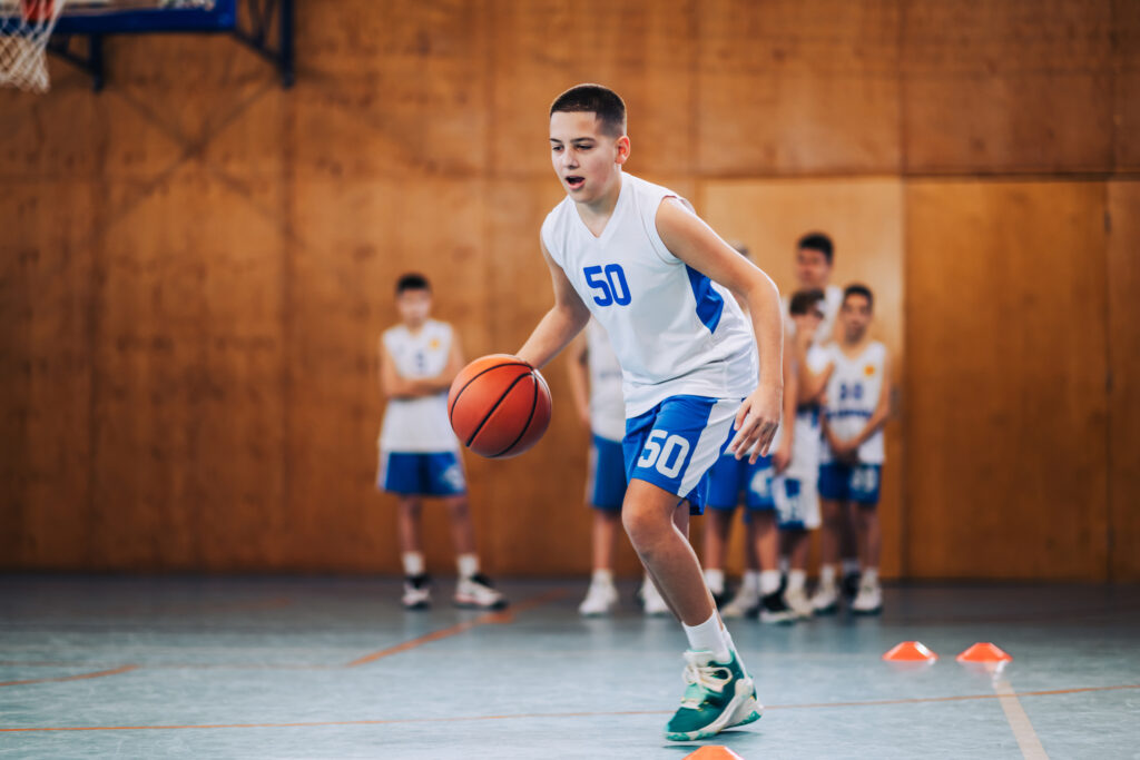 Boys playing basketball
