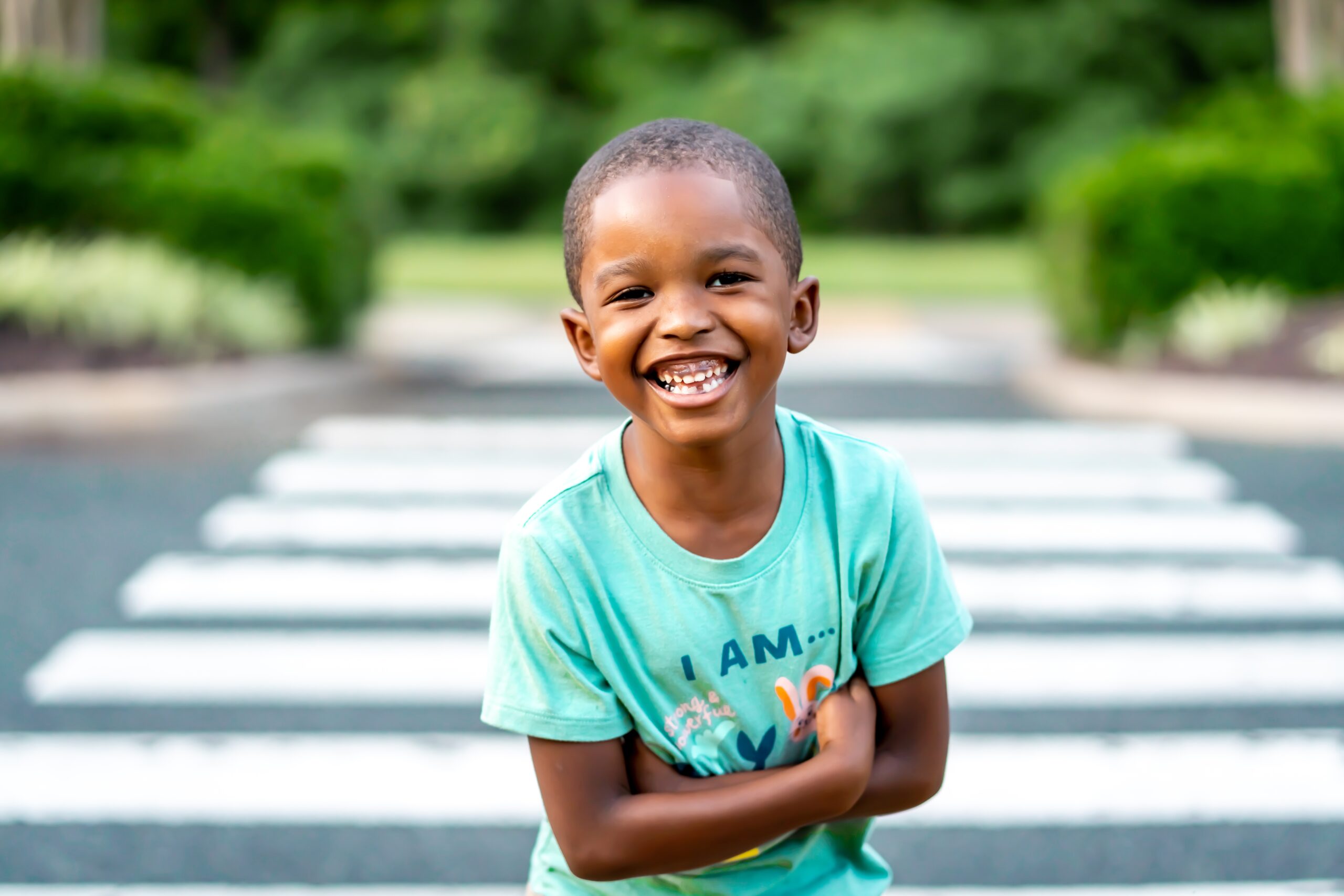 Child infront of a street